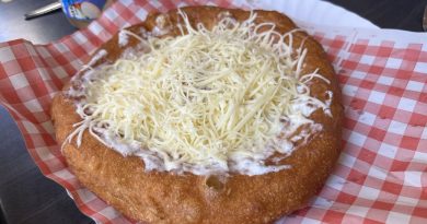 Classic langos with cheese and sour cream at Krumplis Budapest