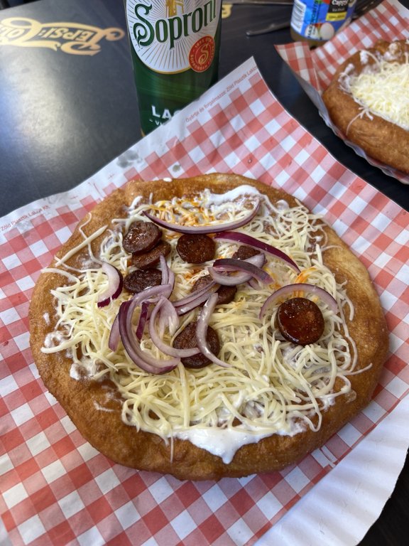 Our Hungarian lángos with sausage, red onion and cheese