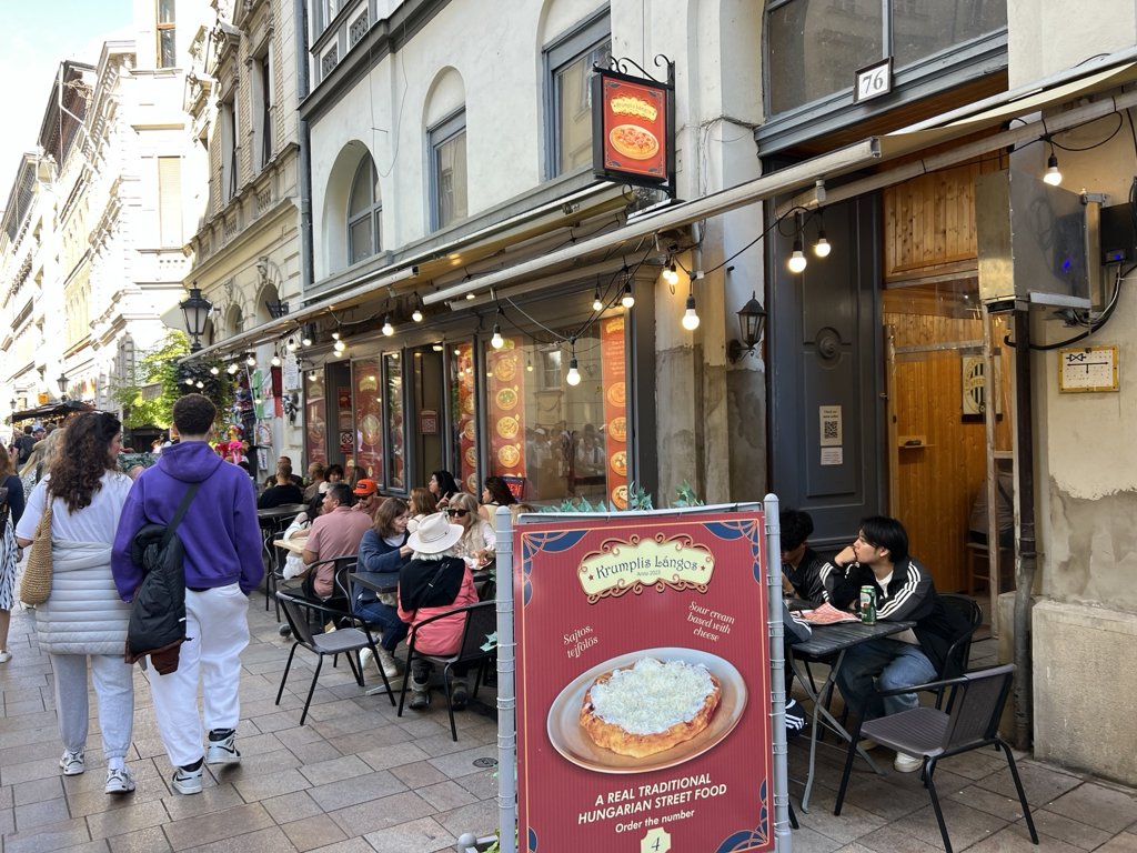 Krumplis Lángos and its outdoor tables on Váci utca