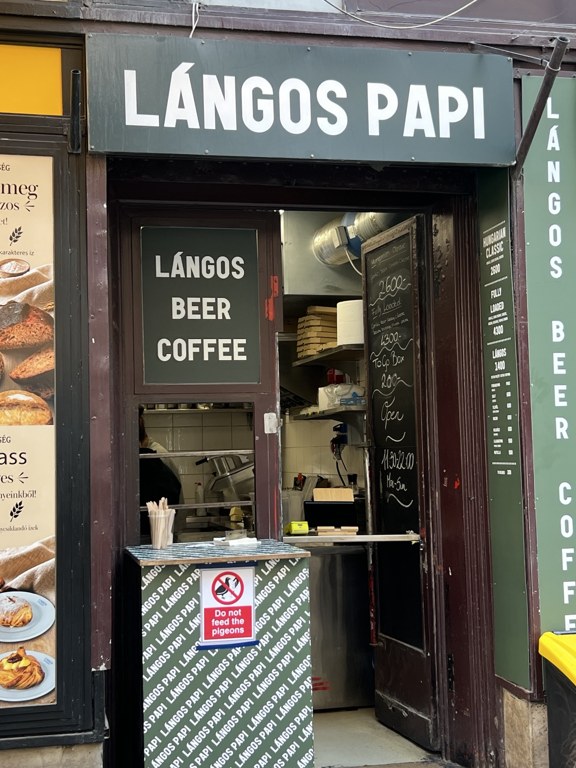 Langos Papi sign and ordering counter in Budapest