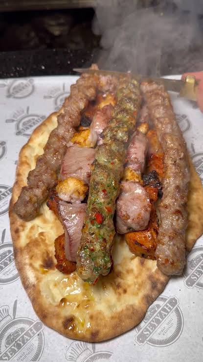 Mixed kebab plate on pide at Seyyah Kebap