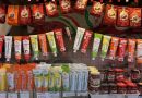 Paprika powders and pepper pastes on shelves at Budapest Central Market Hall