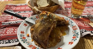 Roast duck served over cabbage and potato tócsni at Pipa Étterem
