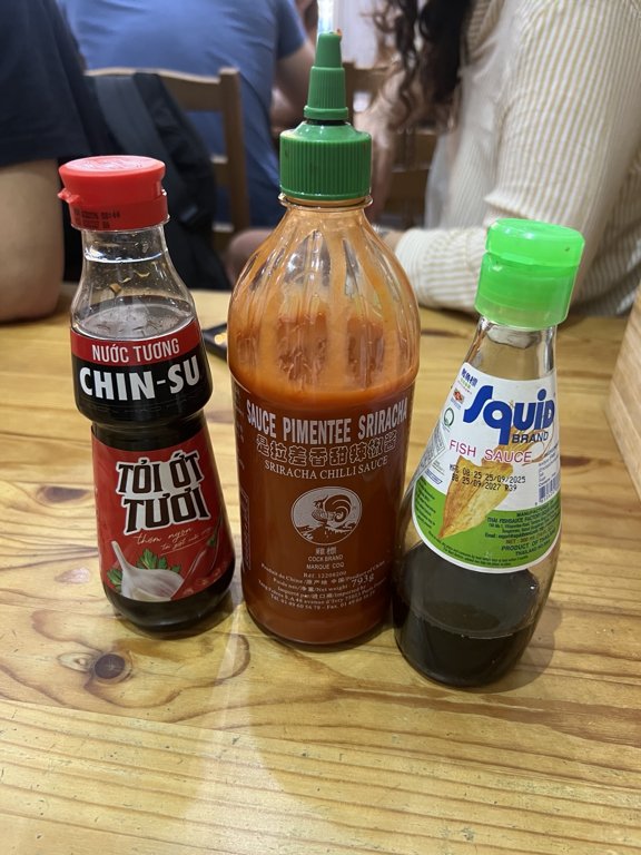 Soy sauce sriracha and fish sauce on our table at Pho Very Good