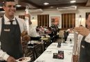 Waiters serving meat on skewers at Churrascaria Estância’s Catumbi branch in São Paulo